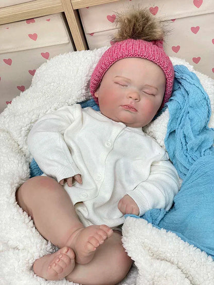 Amelie – 55 cm-es édes, alvó újjászületett baba puha, ölelős testtel