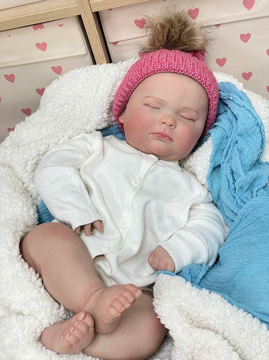 Amelie – 55 cm-es édes, alvó újjászületett baba puha, ölelős testtel