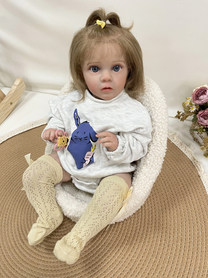 Clara – 60 cm-es puha szilikon újjászületett kislánybaba 3D festett vonásokkal és kézzel ültetett hajjal