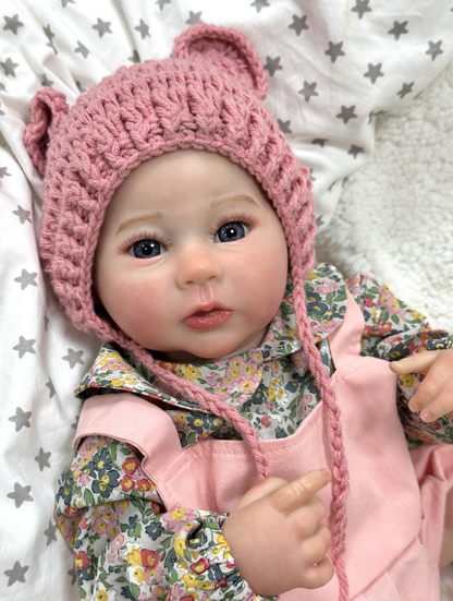 Olivia – 50 cm-es mosolygó újjászületett kislánybaba, valósághű szilikon vinyl újszülött